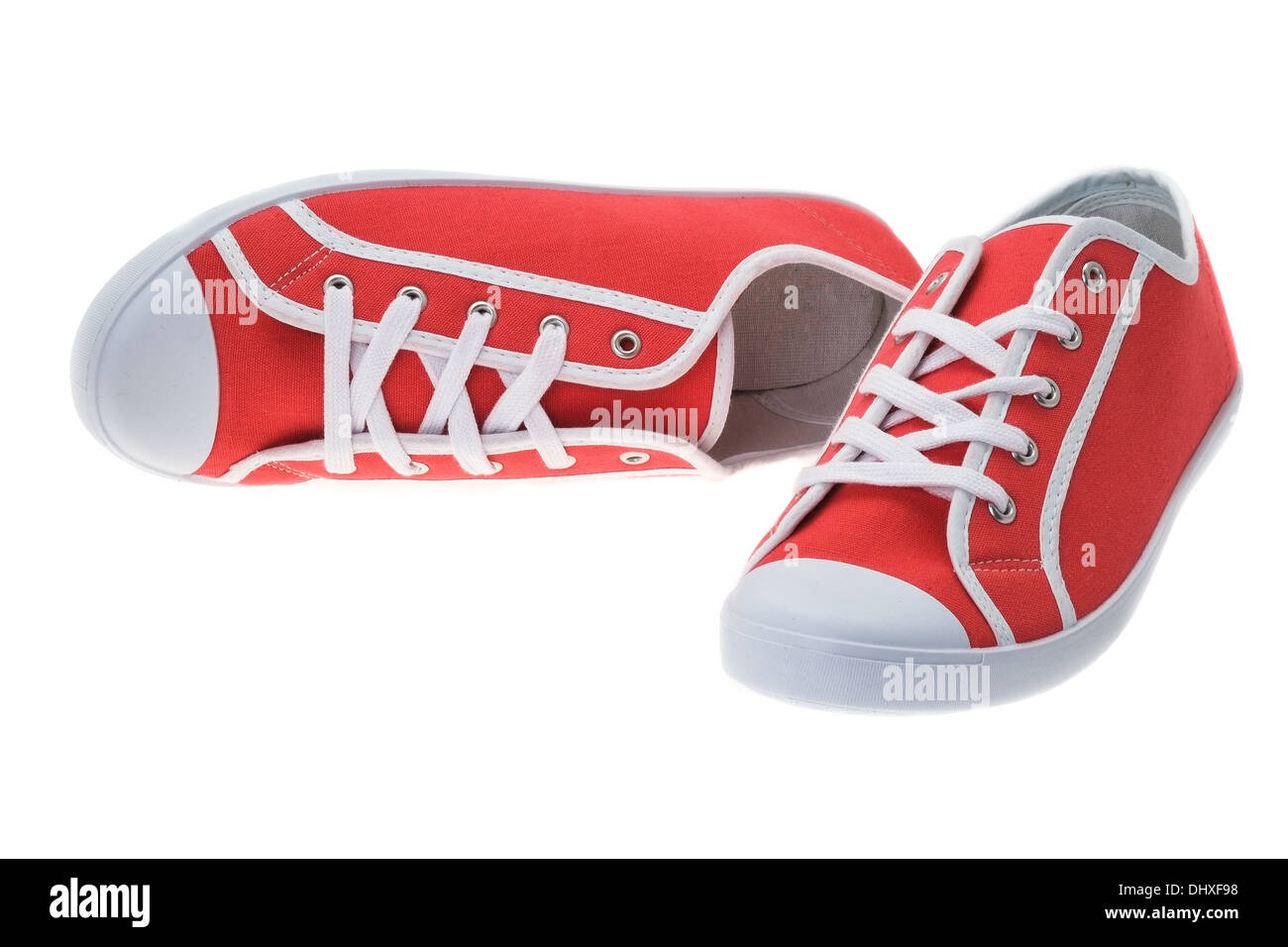 Studioaufnahme von ein paar neue Red canvas Schuhe Stockfoto