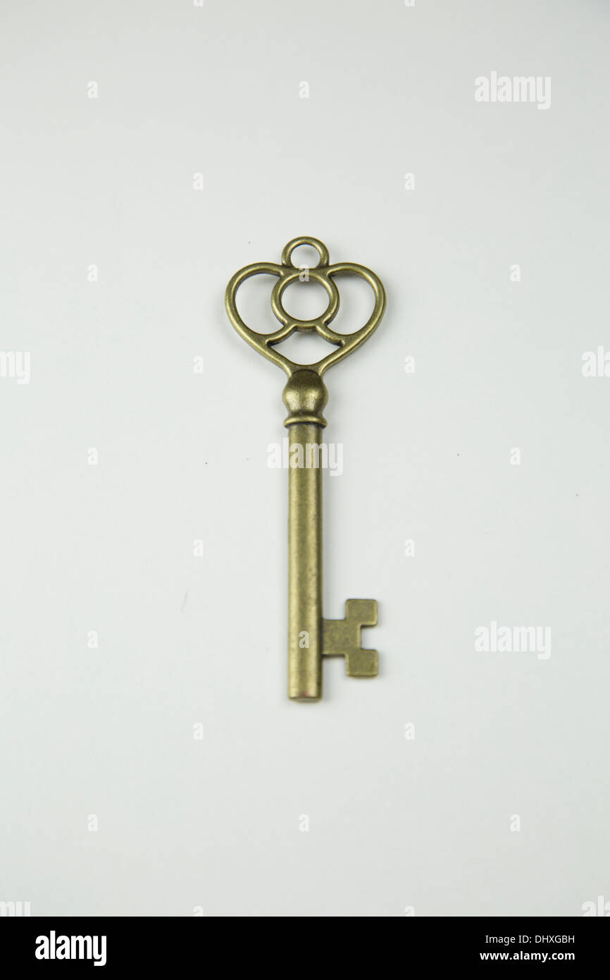 Silberner großer alter Schlüssel mit Schlüsselanhänger Stock-Foto