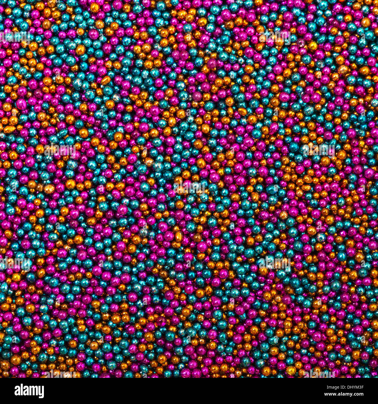 Hintergrund aus Türkis, rosa und goldenen Kugeln Wulst, Nagel Dekoration Kaviar Stockfoto