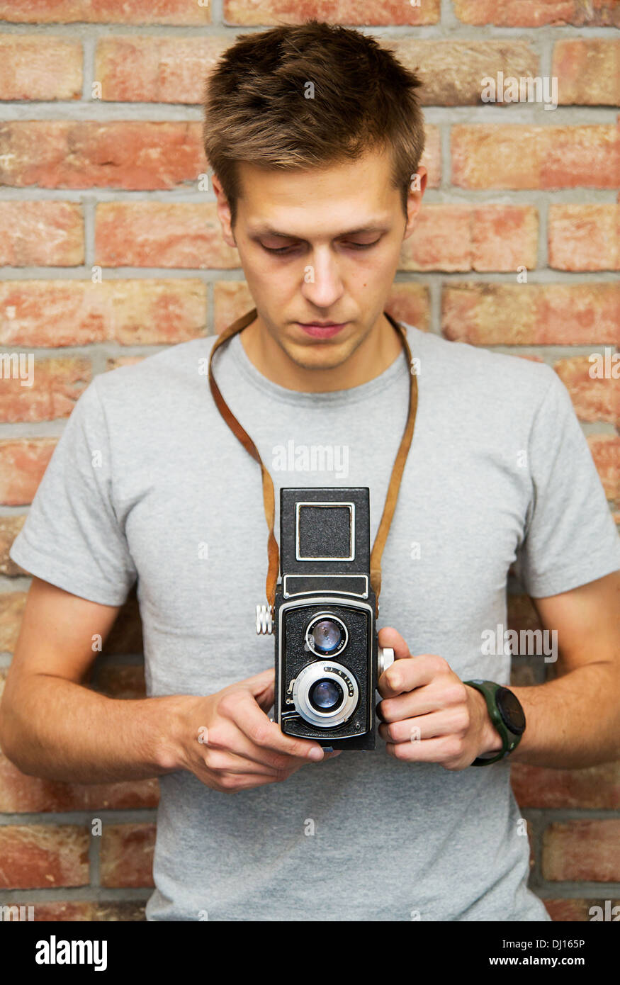 Mann mit alte Kamera Stockfoto