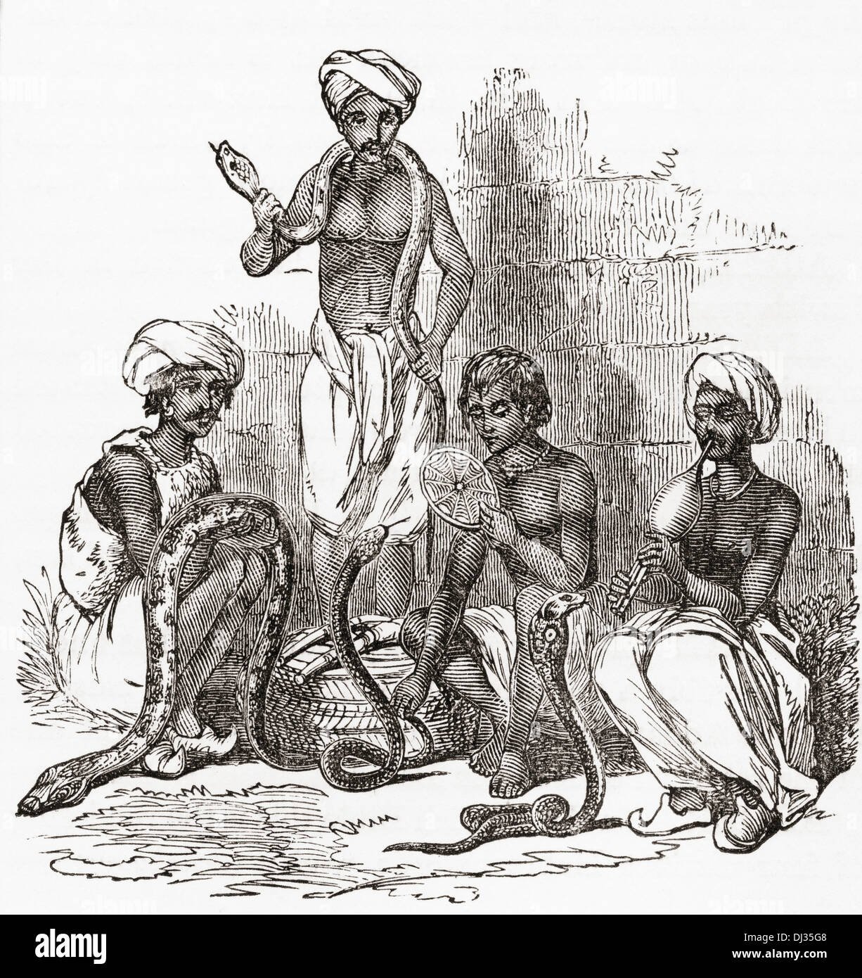 Indischer Schlangenbeschwörer im 19. Jahrhundert. Stockfoto