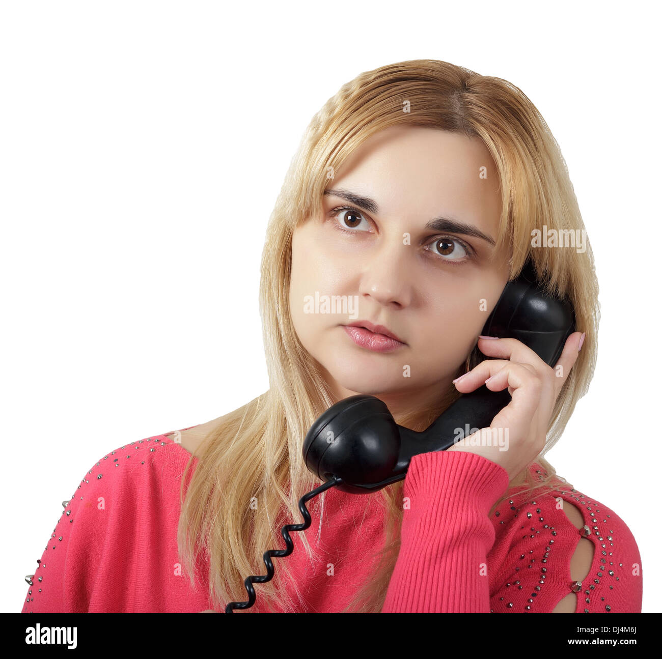 junge Frau mit einem Telefon, isoliert auf weiss Stockfoto