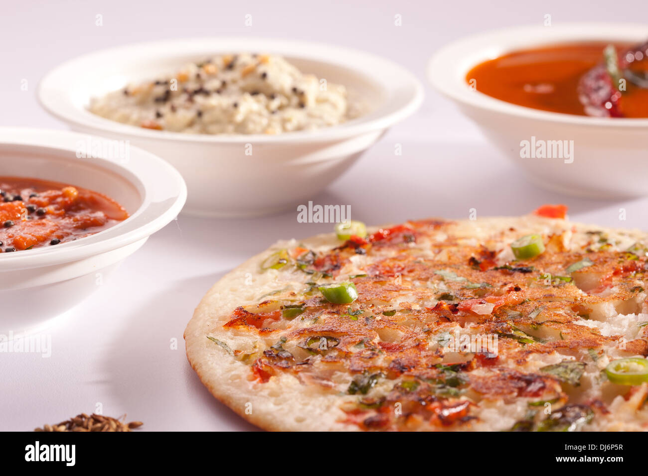 Zwiebel Dosa - ein würziger Pfannkuchen aus Südindien. Stockfoto Zwiebel Dosa - ein würziger Pfannkuchen aus Südindien. Stockfoto