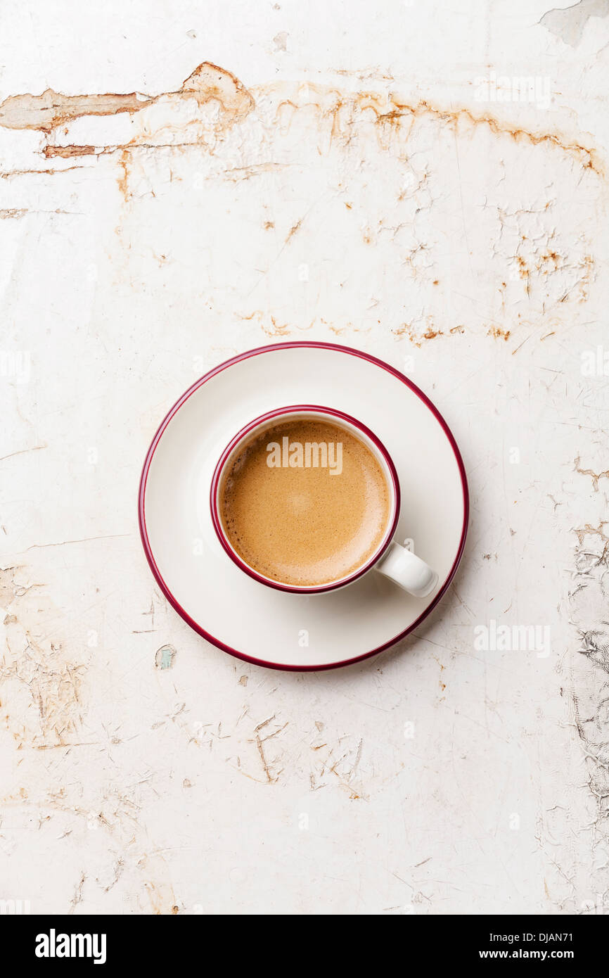 Kaffeetasse auf Beige Hintergrund Stockfoto