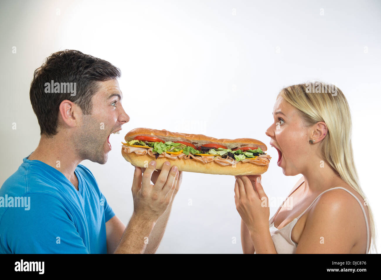 Mann und Frau Sandwich zu essen Stockfoto