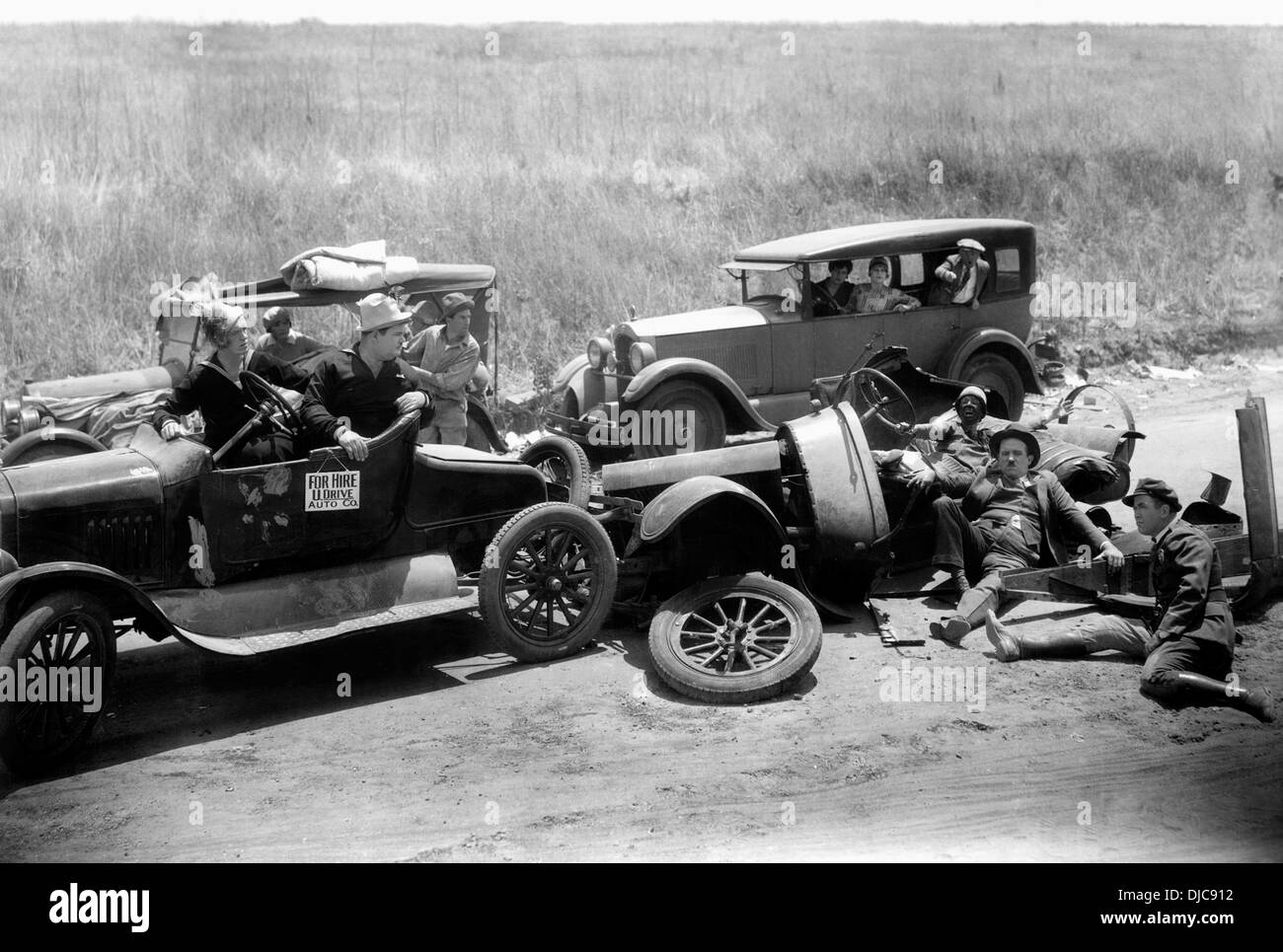 Stan Laurel, Oliver Hardy und Edgar Kennedy am Set des Films, zwei Teere, 1928 Stockfoto