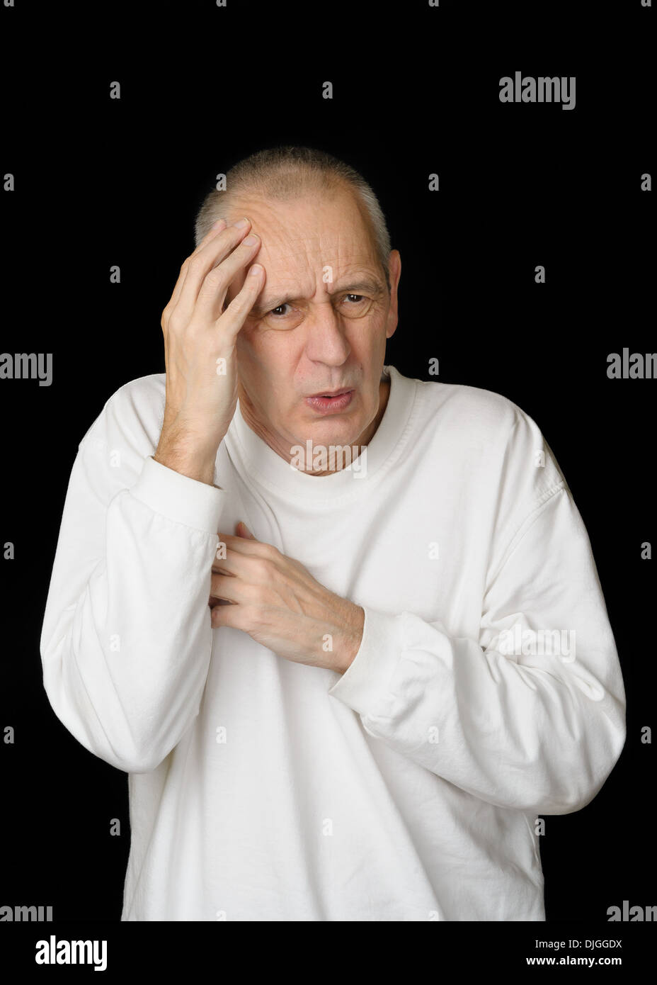 Ein kranker Mann mit Kopfschmerzen und Fieber Stockfoto