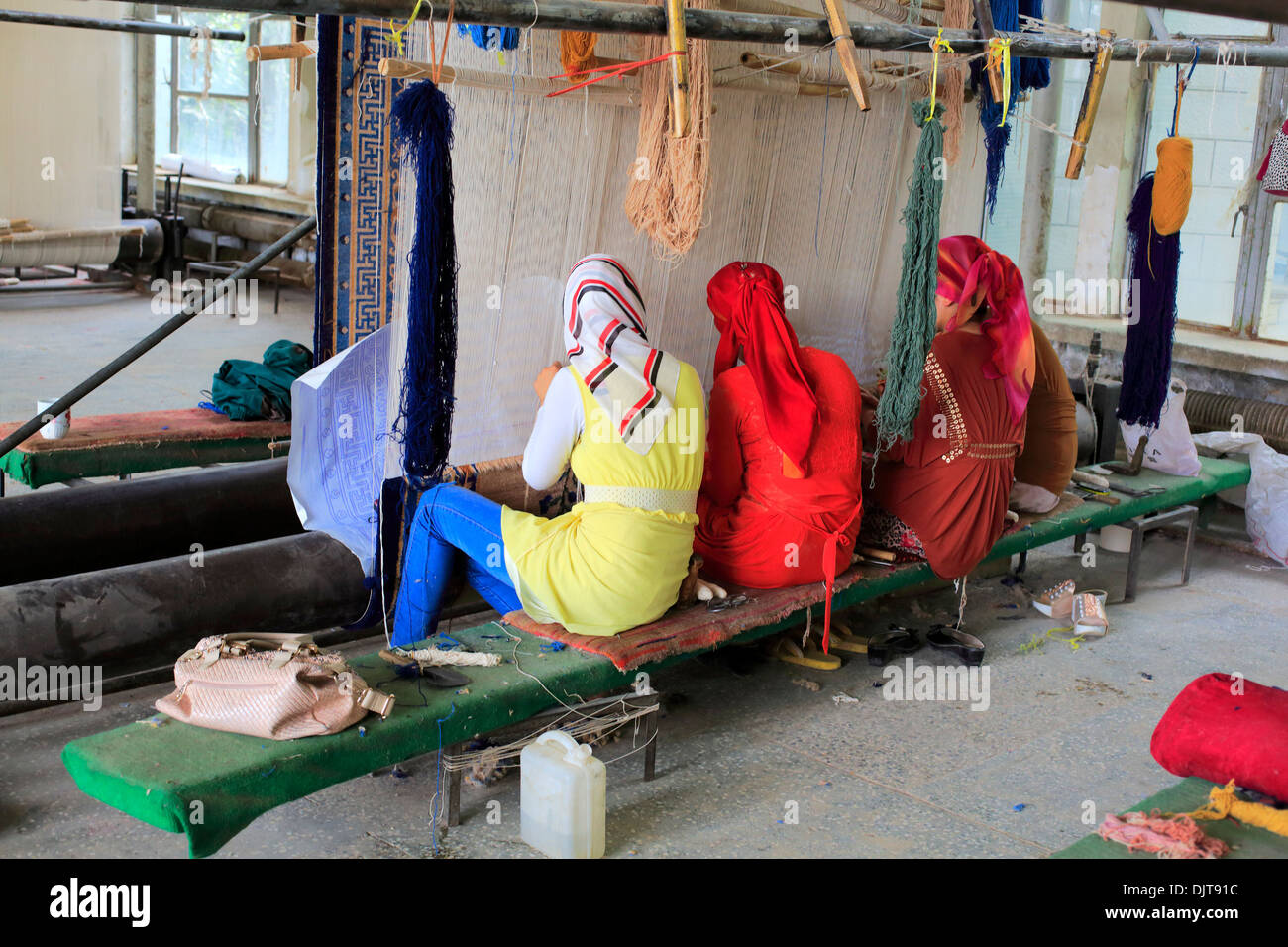 Teppich Produktion Fabrik, Hotan, Hotan Präfektur, Uigurischen Autonomen Gebiet Xinjiang, China Stockfoto