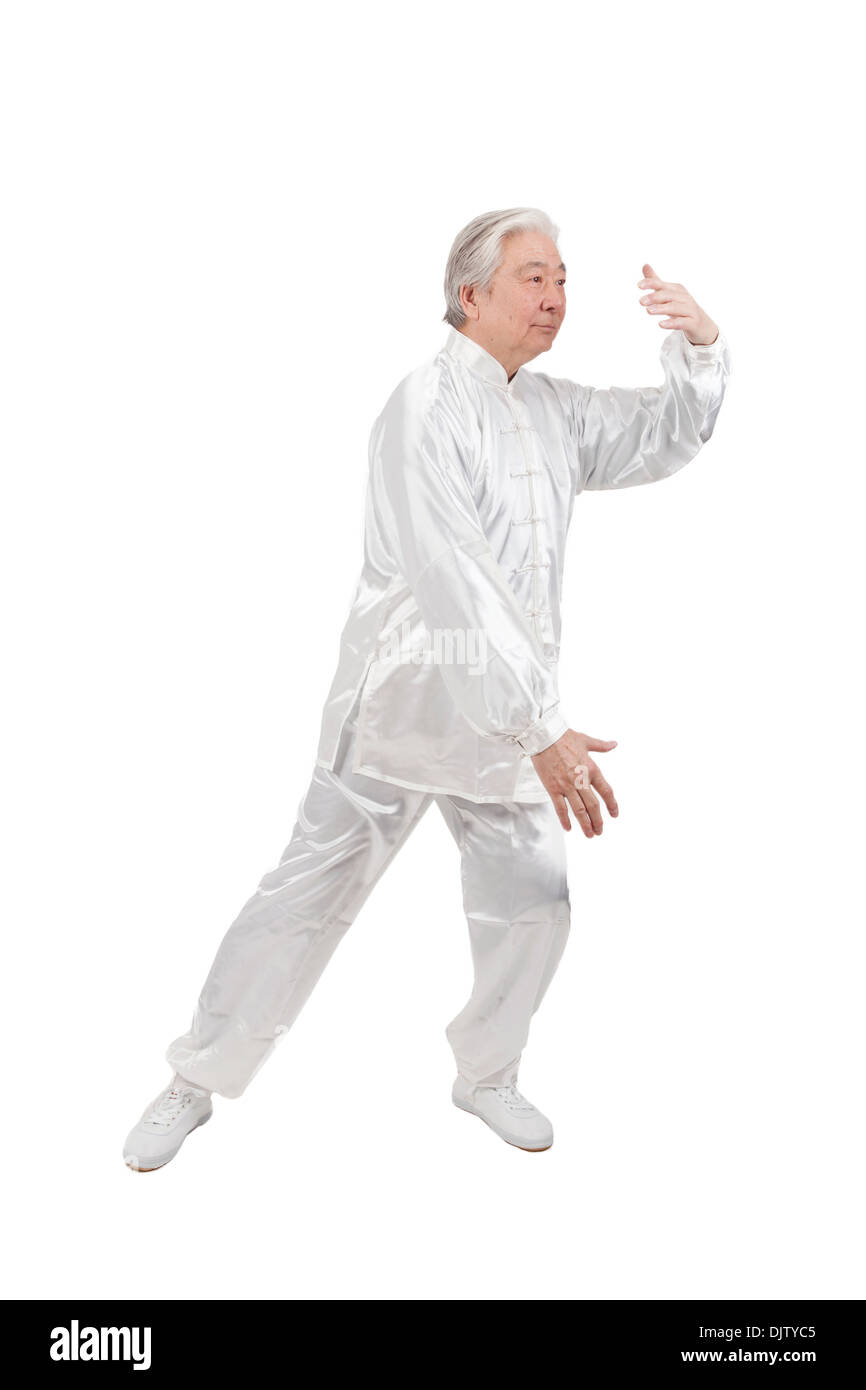 Senior woman Tai Chi zu tun Stockfoto