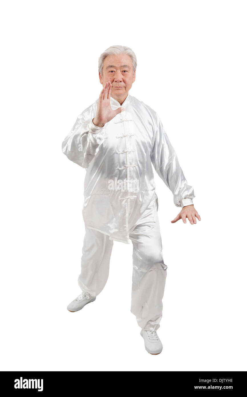 Senior woman Tai Chi zu tun Stockfoto