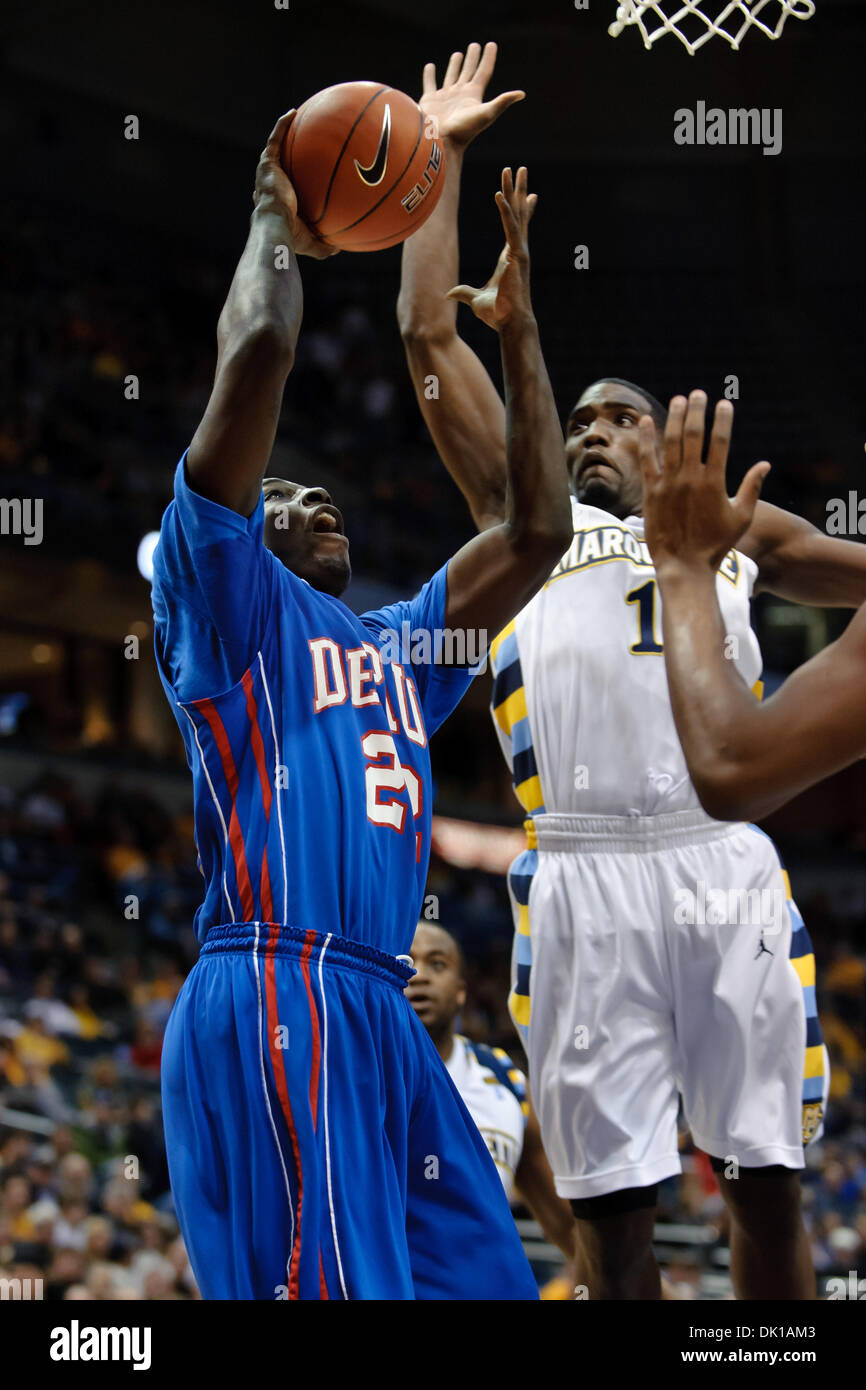 18. Januar 2011 - Milwaukee, Wisconsin, USA - DePaul vorwärts hat Tony Freeland (22) seine abgewehrt Marquette Wache Darius Johnson-Odom (1) während des Spiels zwischen Marquette Golden Eagles und die DePaul Blue Dämonen im Bradley Center in Milwaukee, Wisconsin. Marquette besiegte DePaul 94-64. (Kredit-Bild: © John Rowland/Southcreek Global/ZUMAPRESS.com) Stockfoto