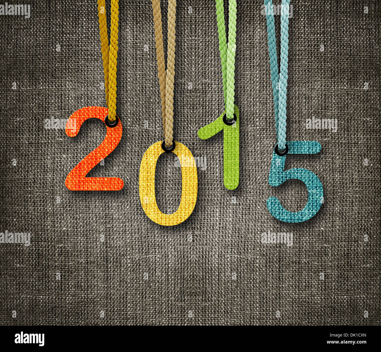 Frohes neues Jahr 2015, Zahlen Hunging durch Seil als Puppenspieler auf Sackleinen Hintergrund, das gleiche Konzept für 2016 zur Verfügung. Stockfoto