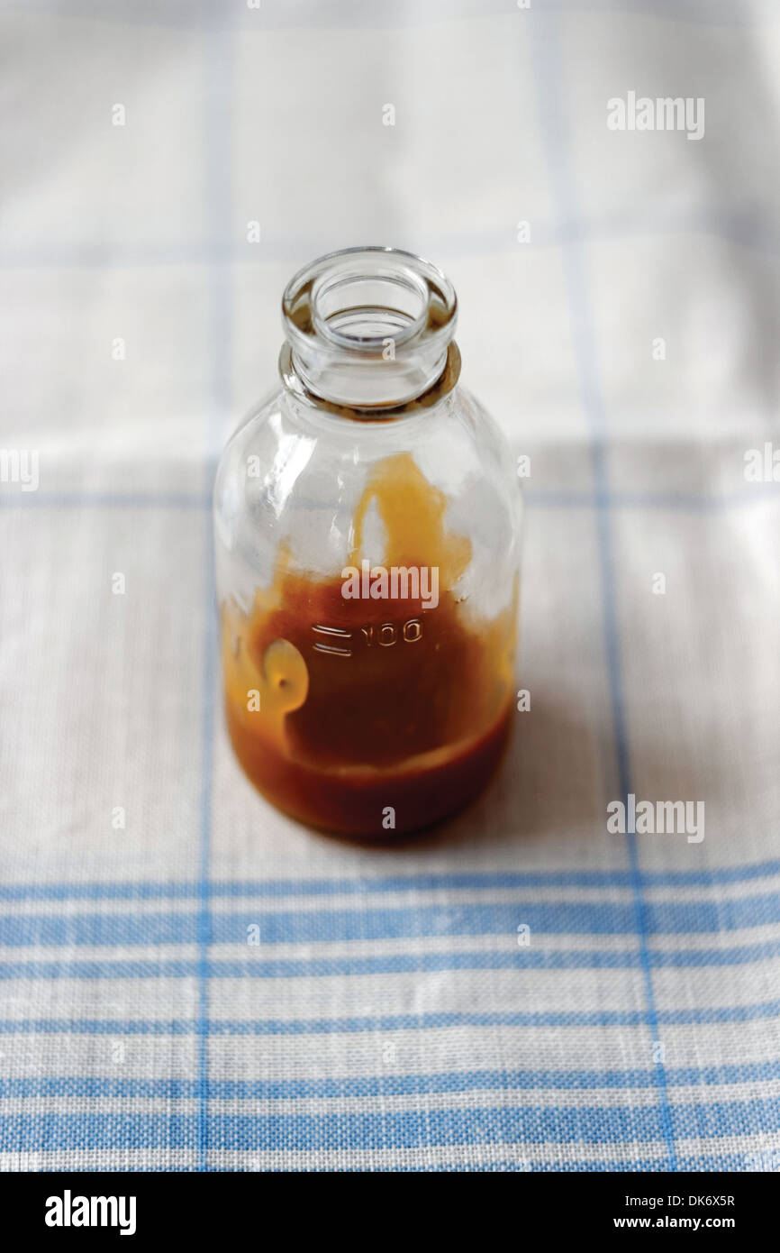Karamell-Sauce im Glas Stockfoto