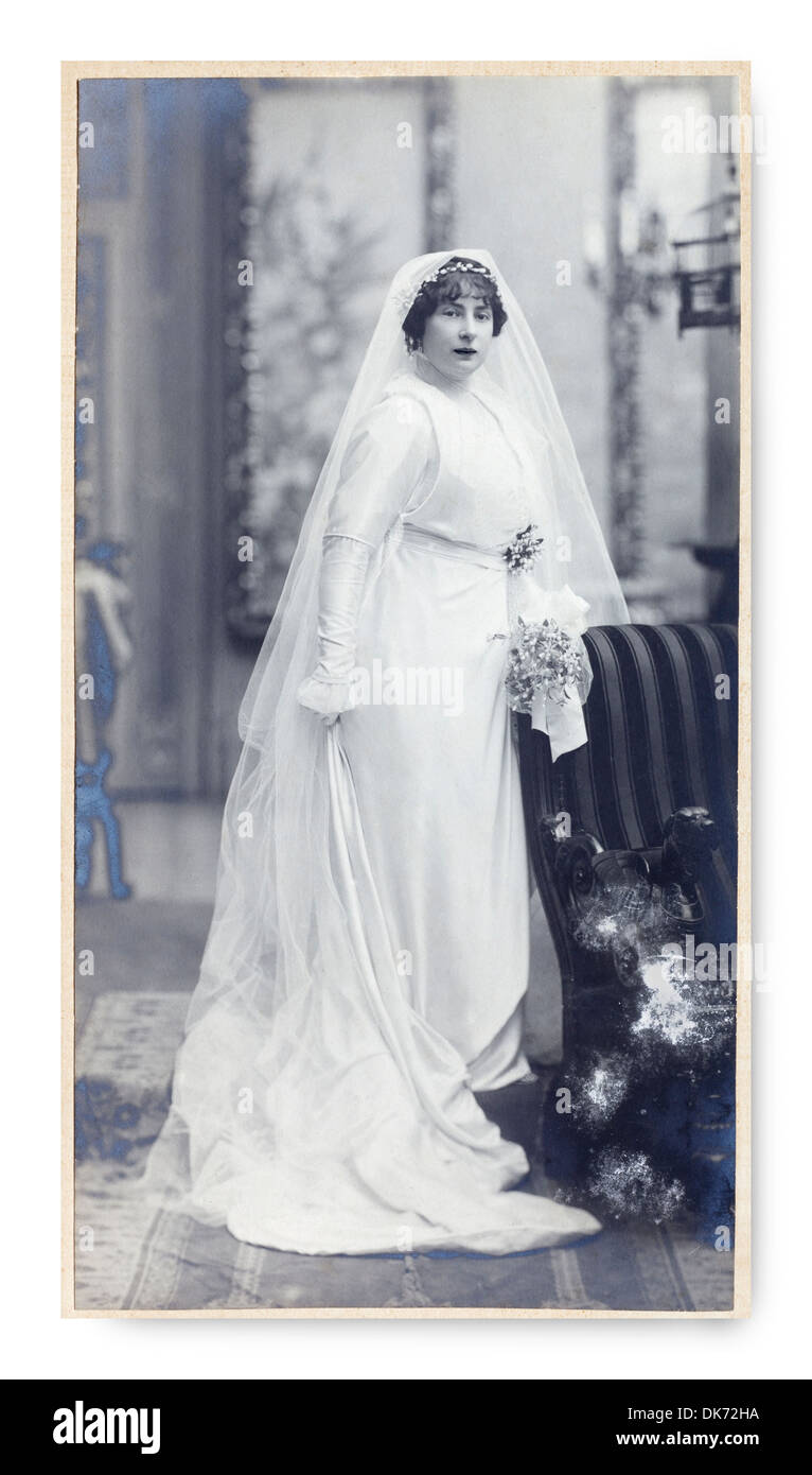 Antike Portrait of a Lady. Fotostudio. Jahrgang. 1900. Hochzeitskleid Stockfoto