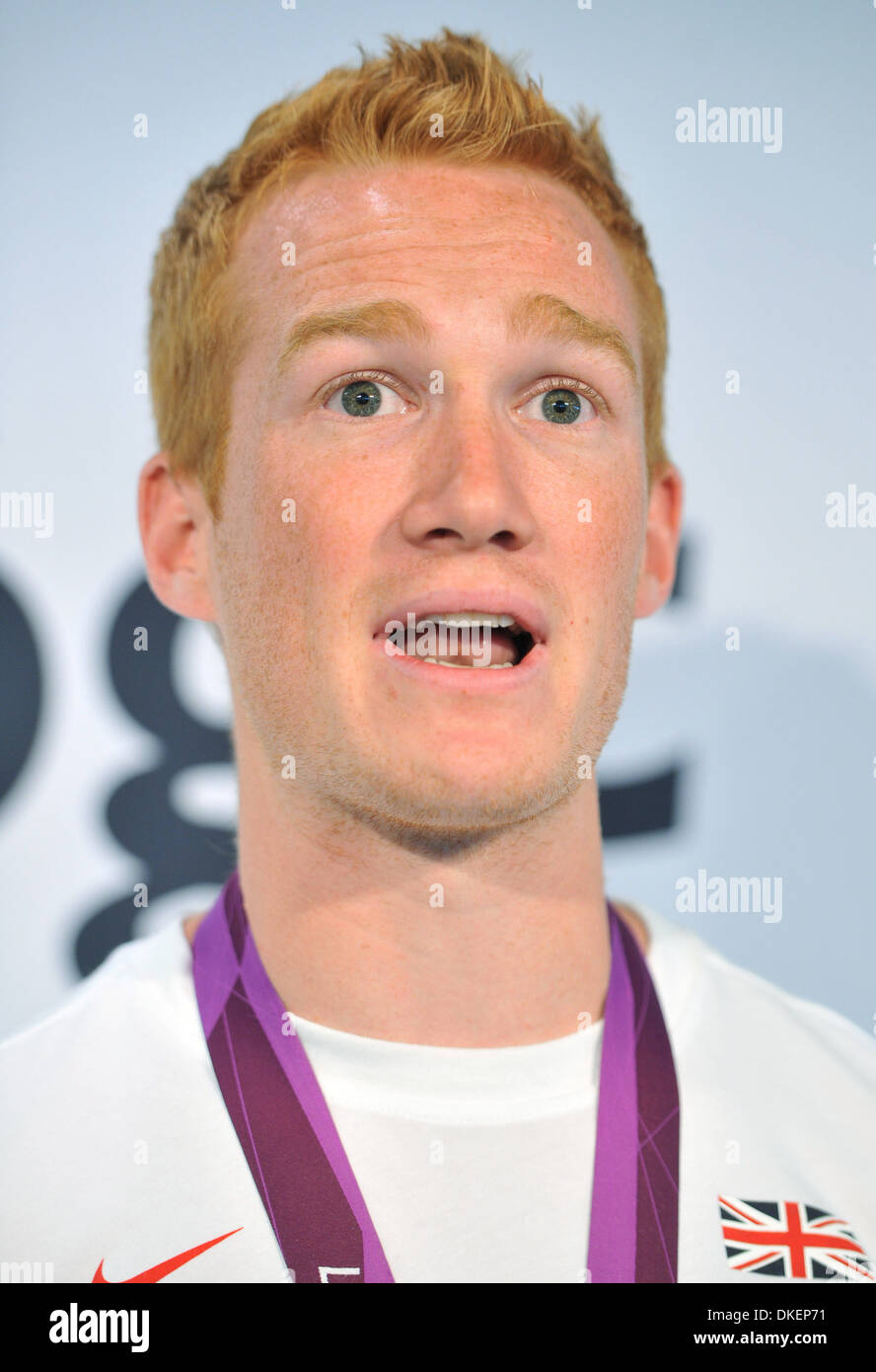 Greg Rutherford BGC jährliche globale Charity Day am Churchill Place London England - 11.09.12 Stockfoto