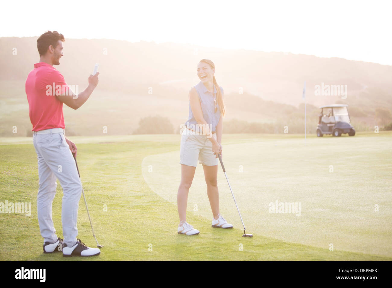 Paar, Golfen Stockfoto