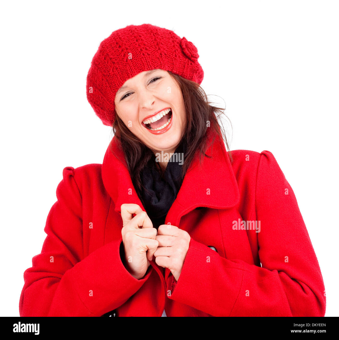 Junge Frau im roten Mantel und Kappe Lachen - Isolated on White Stockfoto