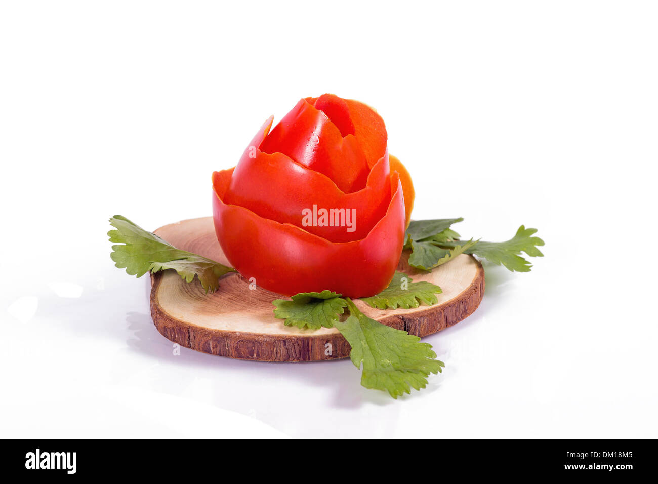 Tomaten mit einer Blume auf einem weißen Hintergrund Stockfoto