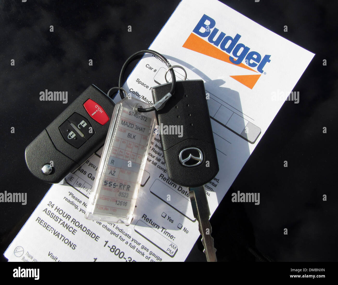 Budget Rent ein Auto und Schlüssel. Die Lizenznummer wurde digital verändert. Stockfoto