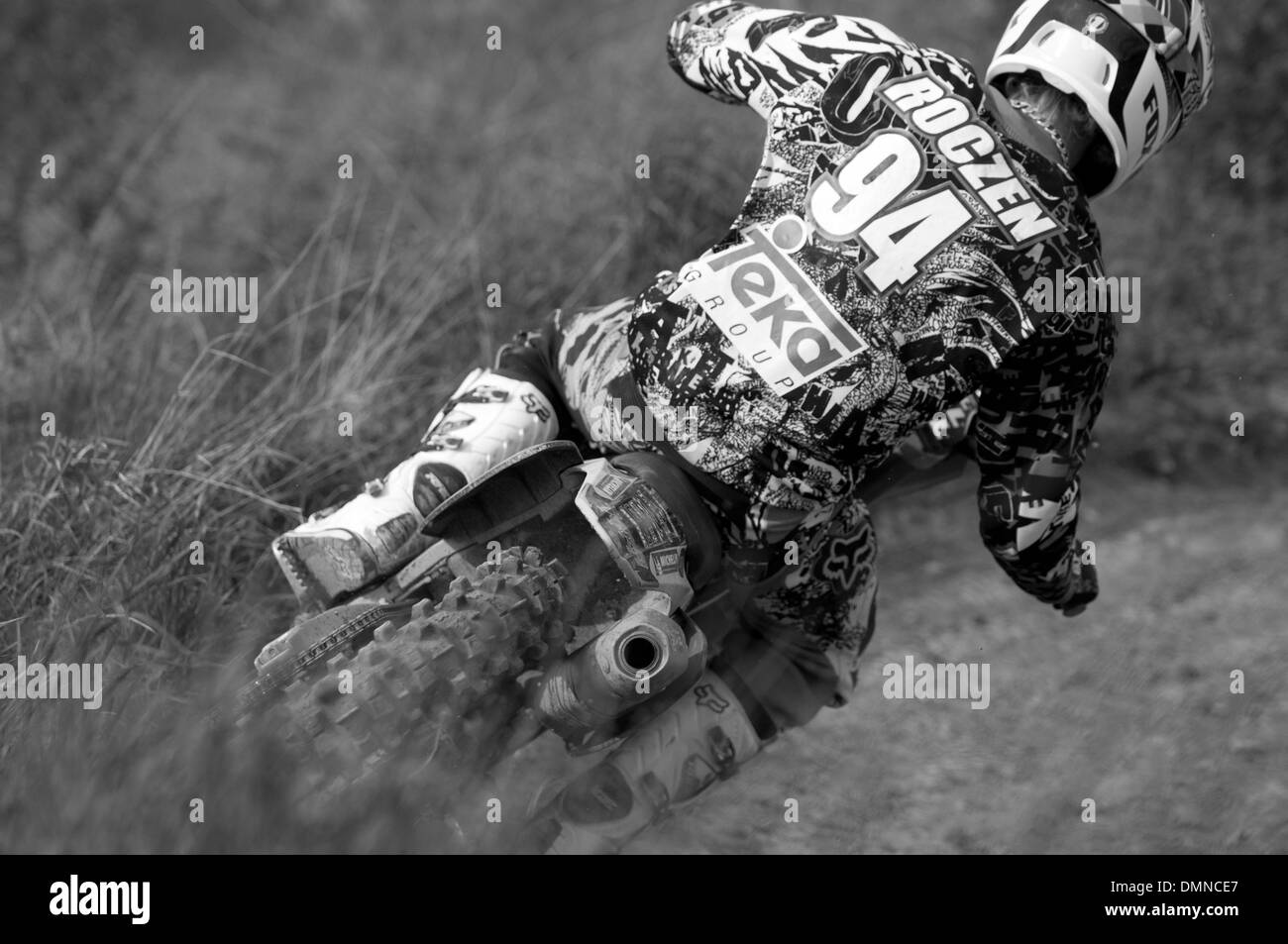 Motocross-Fahrer auf der Rennstrecke Stockfoto