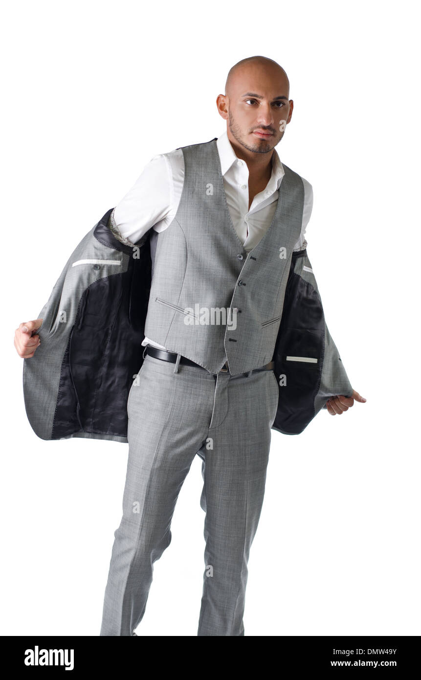 Elegante, Glatze junger Mann in Anzug, isoliert auf weiss, wegschauen Stockfoto