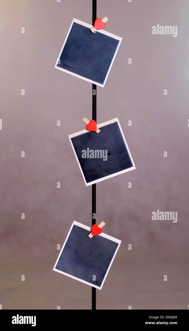 Alte Film-Rohlinge an einem Seil hängen Stockfoto
