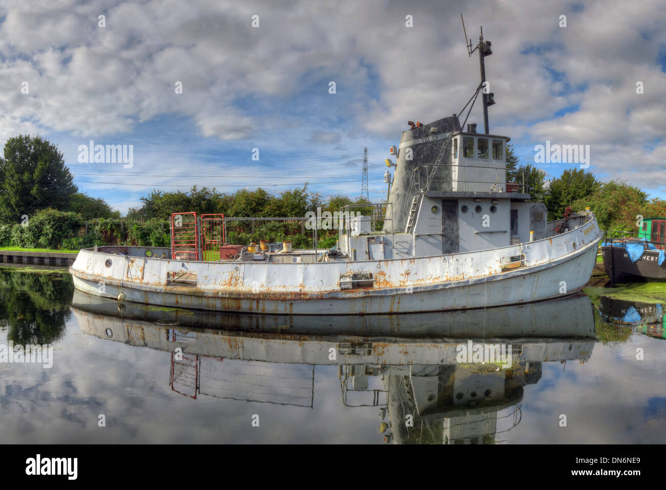 Boot auf dem Sankey Kanal Reflexion Warrington Cheshire England UK Stockfoto