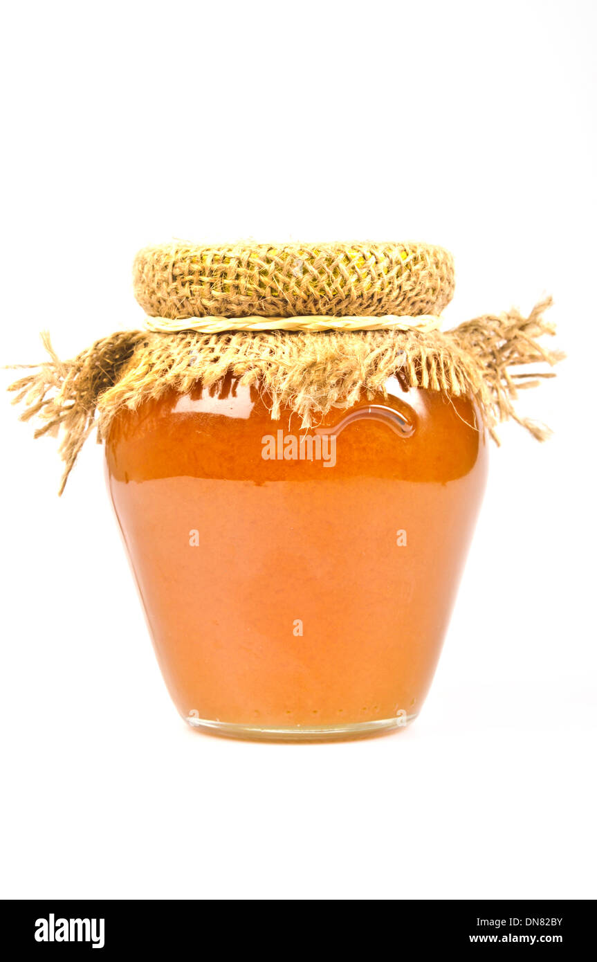 Honig in einem Glas Stockfoto
