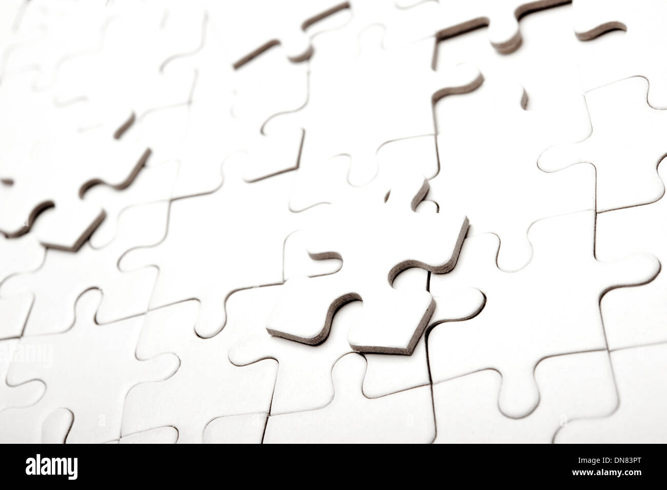 unvollendete leer Jigsaw puzzle Stockfoto