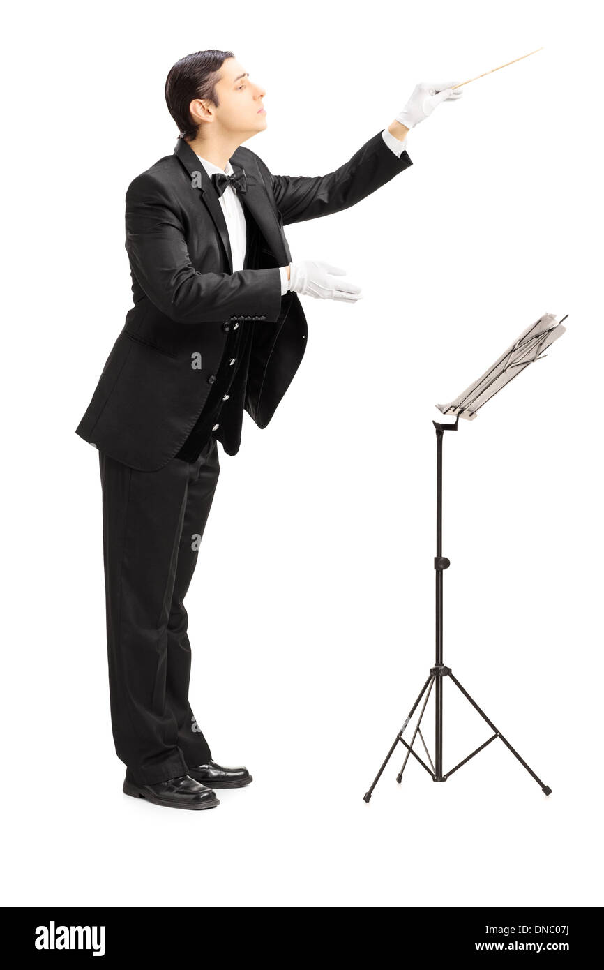 In voller Länge Portrait von einem männlichen Dirigent Regie mit stick Stockfoto