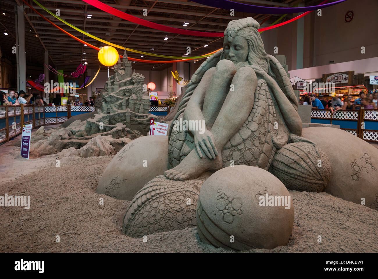 Eine Abbildung einer Frau im Sand an der internationalen Sand sculpting Wettbewerb bei der Canadian National Exhibition 2012 geschnitzt. Stockfoto