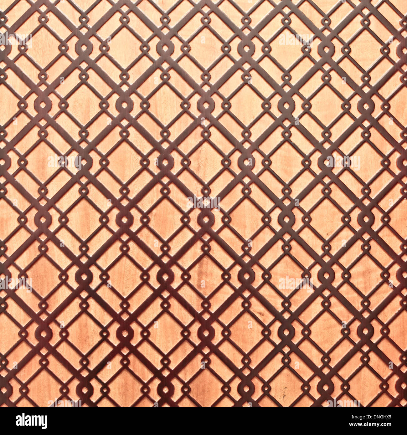Islamische geometrisch auf einer Holzfläche als Hintergrund Stockfoto