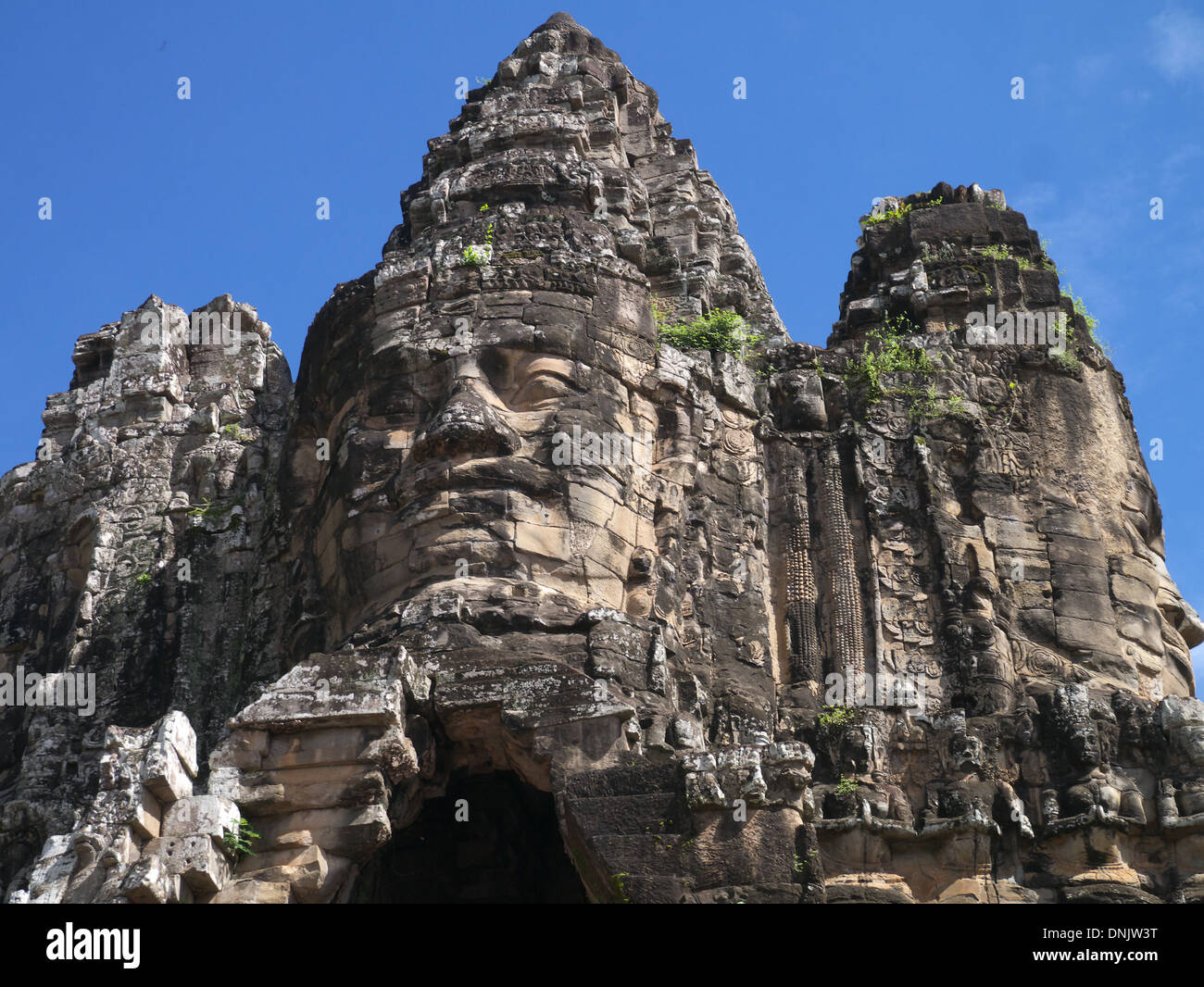 Kambodscha Angkor Thom konfrontiert vier Schnitzen von Jayavarman VII Angkor Wat Website Stein Kopf des Gottes Stockfoto