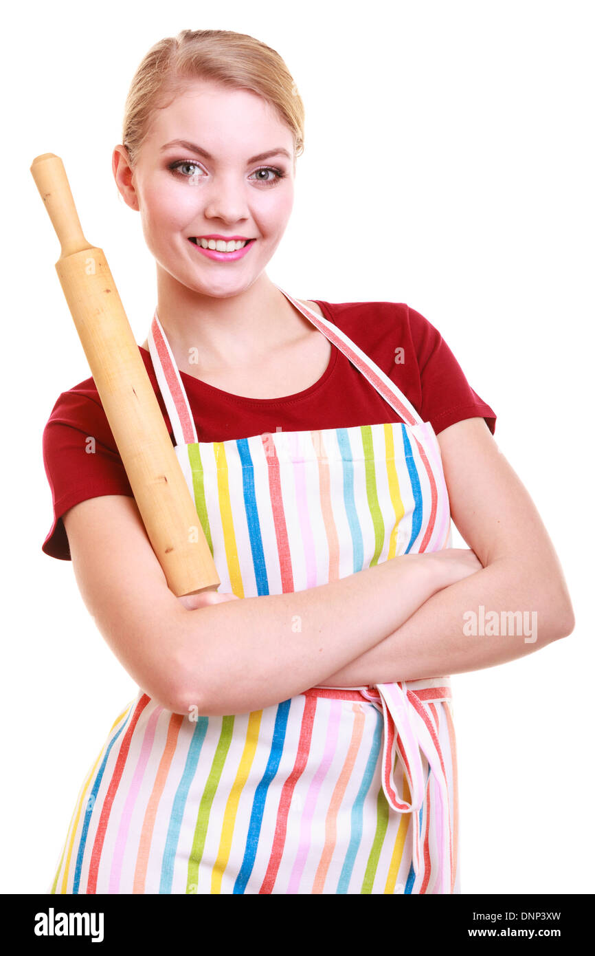 Glückliche Hausfrau oder Bäcker Koch tragen Küchenschürze hält Backen Nudelholz Studio Bild isoliert auf weiss Stockfoto