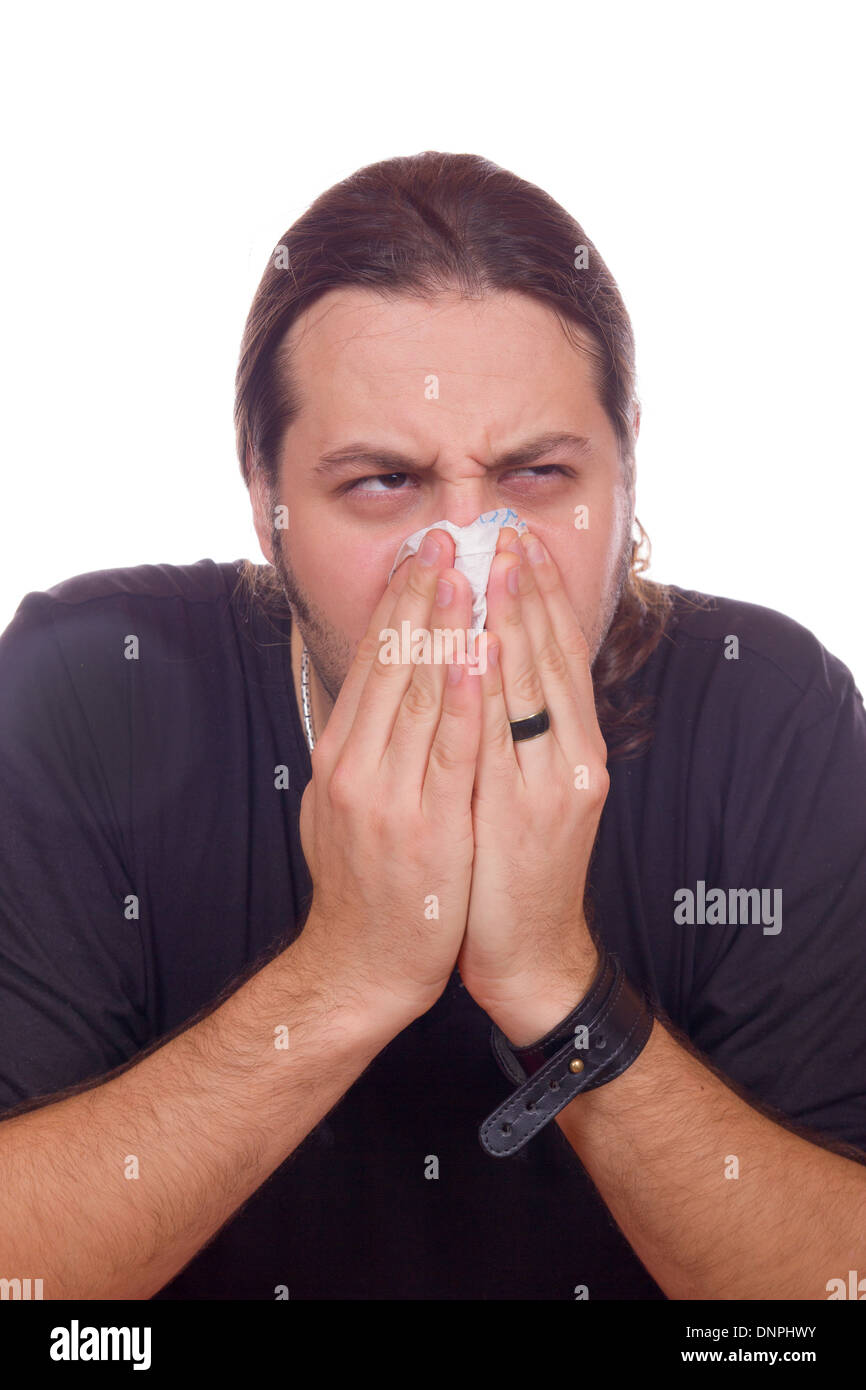 kranker Mann hat Grippe und verstopfte Nase Stockfoto
