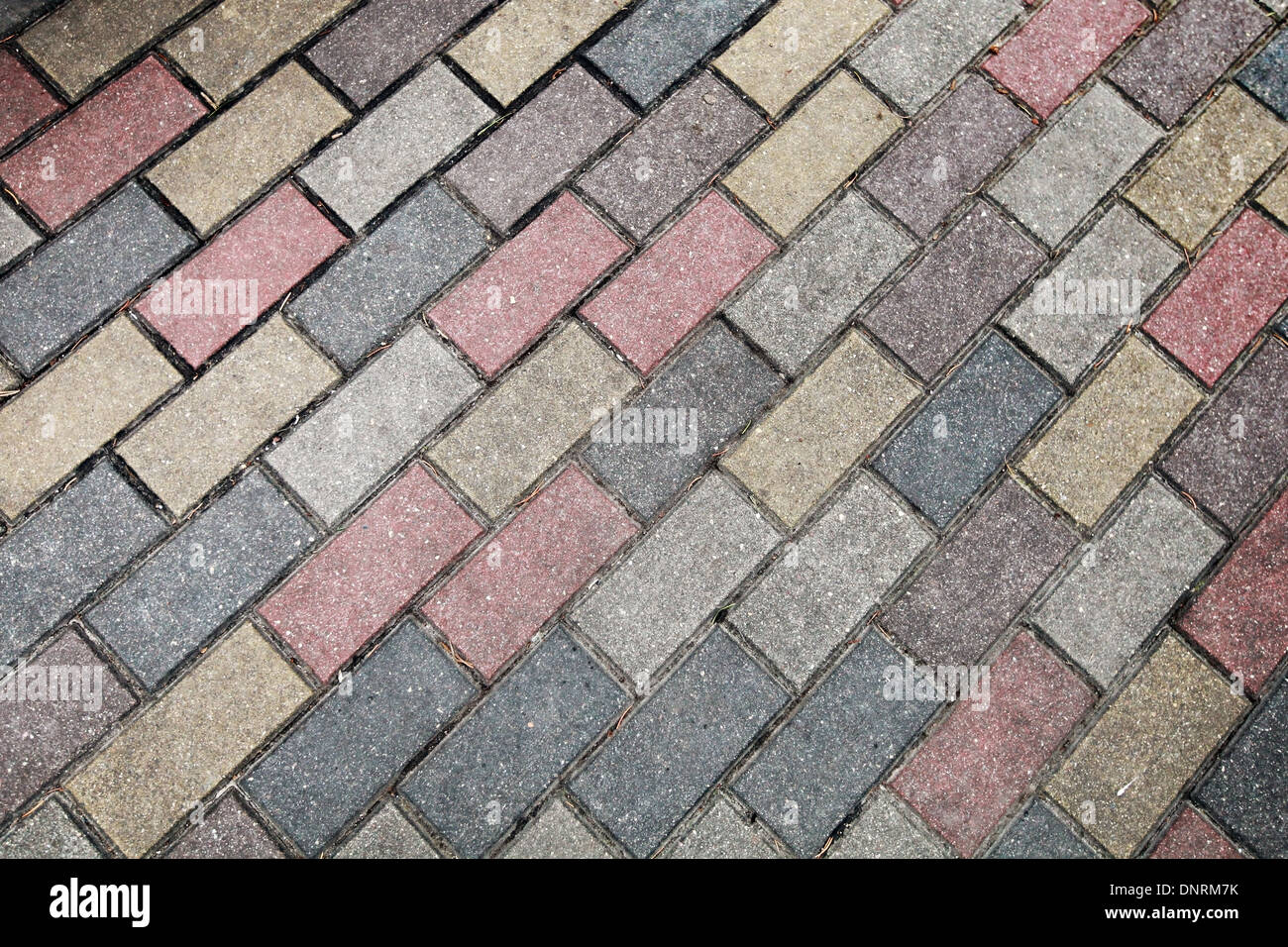 Road-Pflaster-Muster mit bunten Steinen Stockfoto