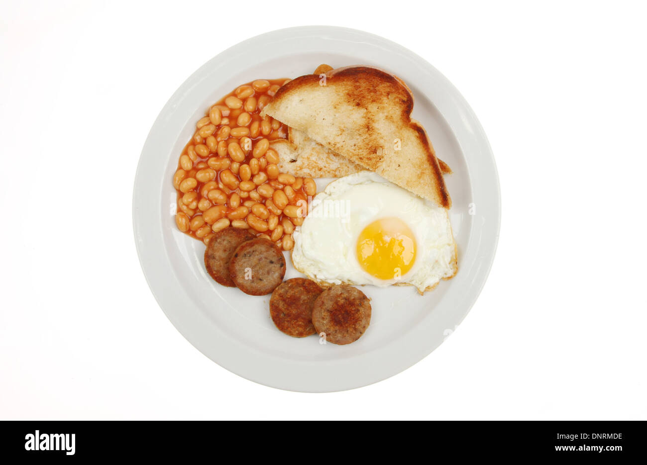 Warmes Frühstück auf einer Platte betrachtet von oben isoliert gegen weiß Stockfoto