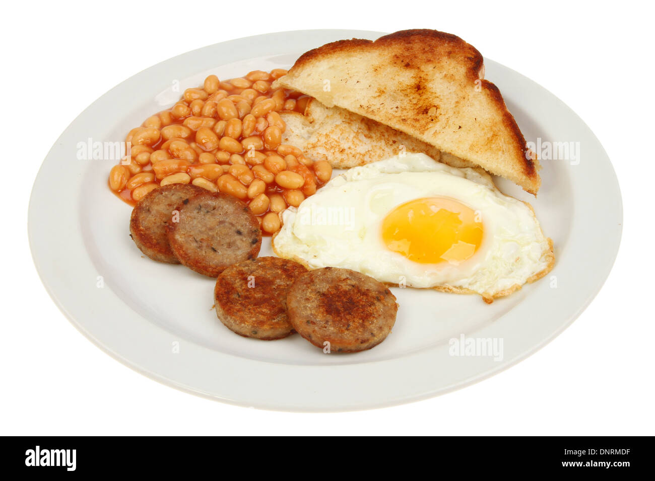 Warmes Frühstück, Schweine Pudding gebratene Ei und Brot mit gebackene Bohnen auf dem Teller isoliert gegen weiß Stockfoto