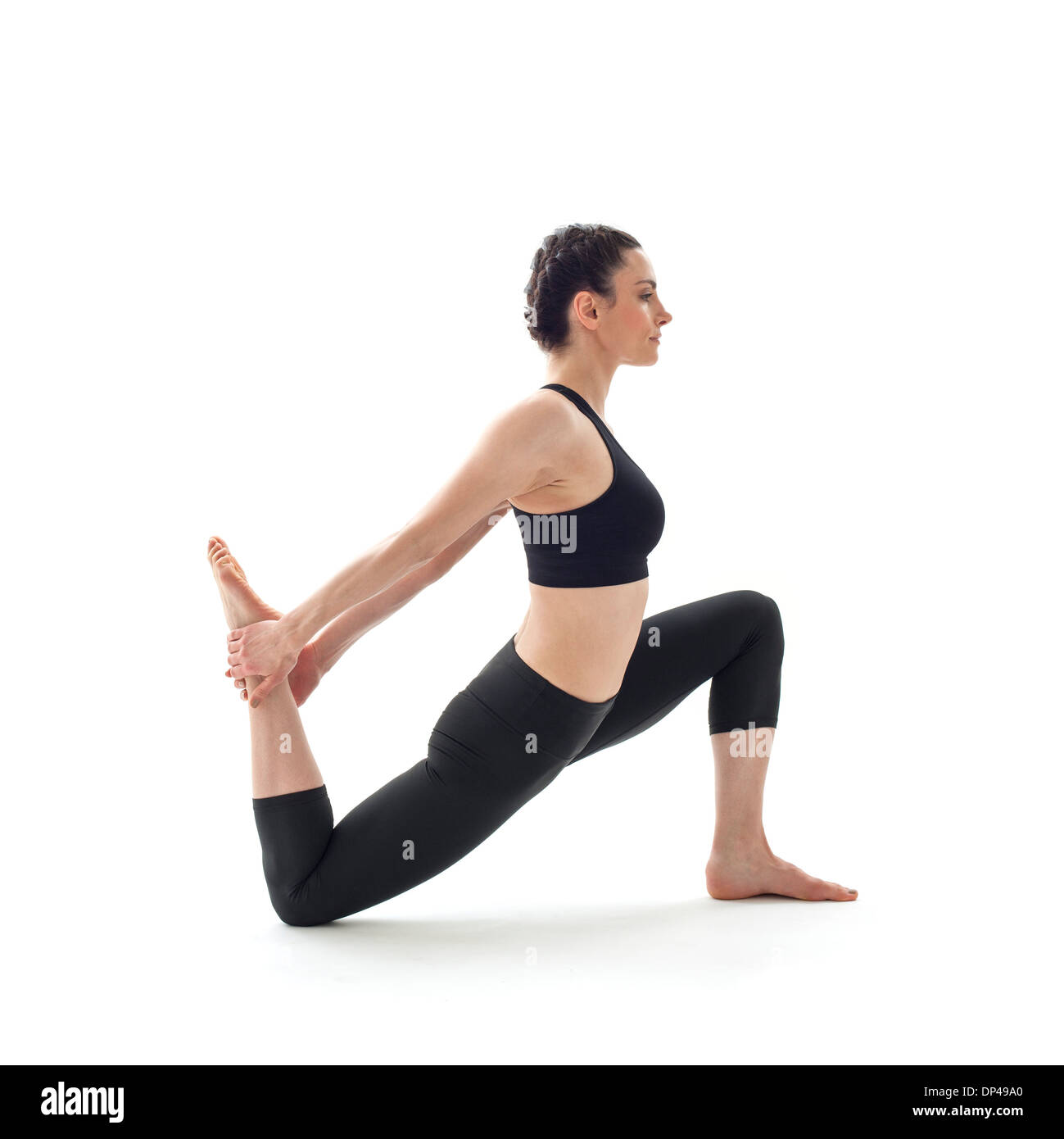 Frau Yoga zu praktizieren Stockfoto