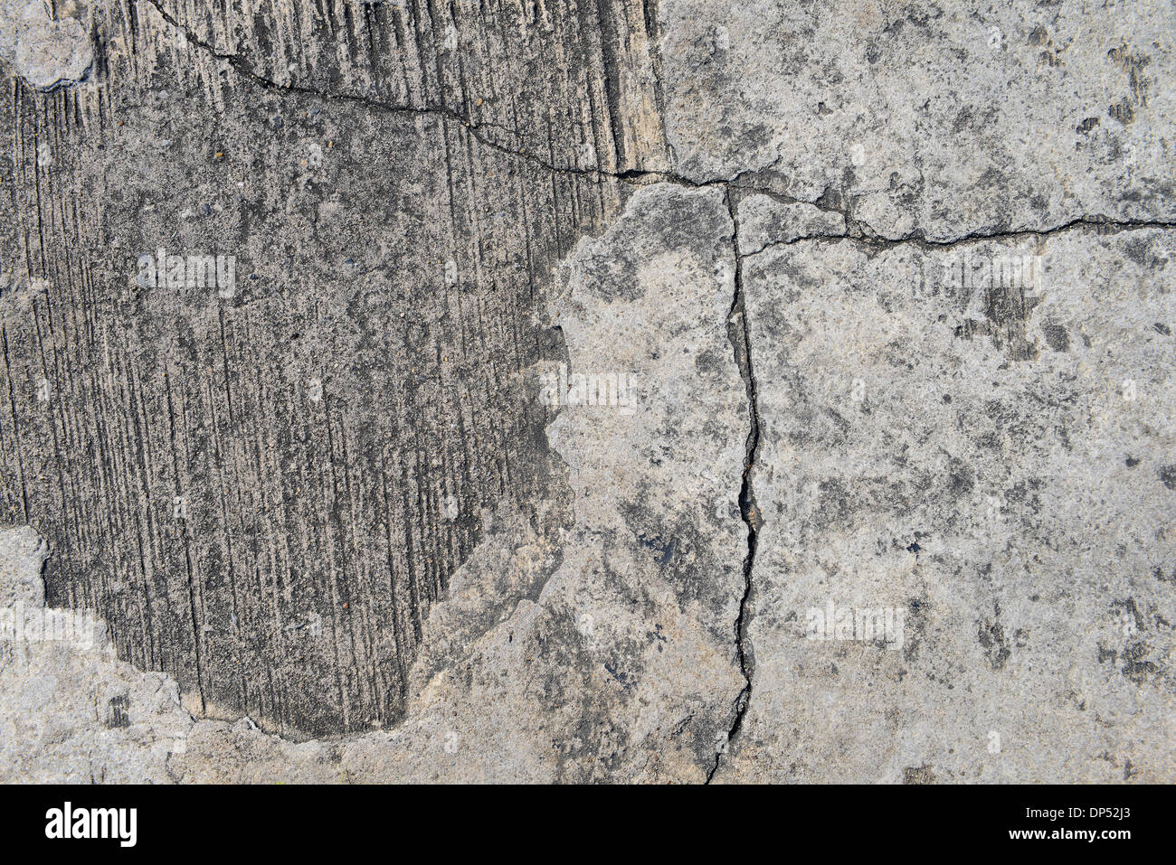 Zusammensetzung des gerissenen Beton Textur Closeup Hintergrund. Stockfoto