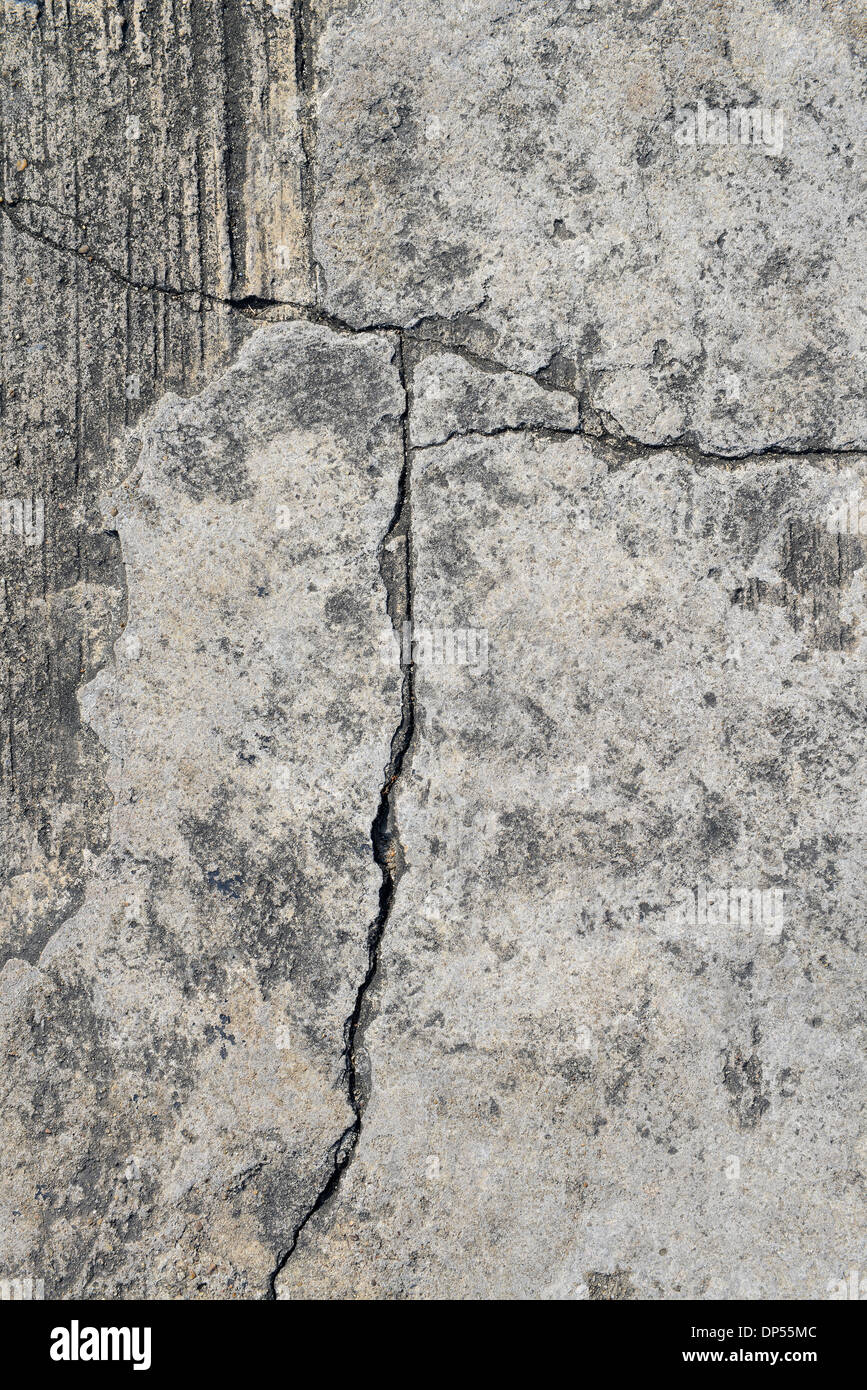 Zusammensetzung des gerissenen Beton Textur Closeup Hintergrund. Stockfoto