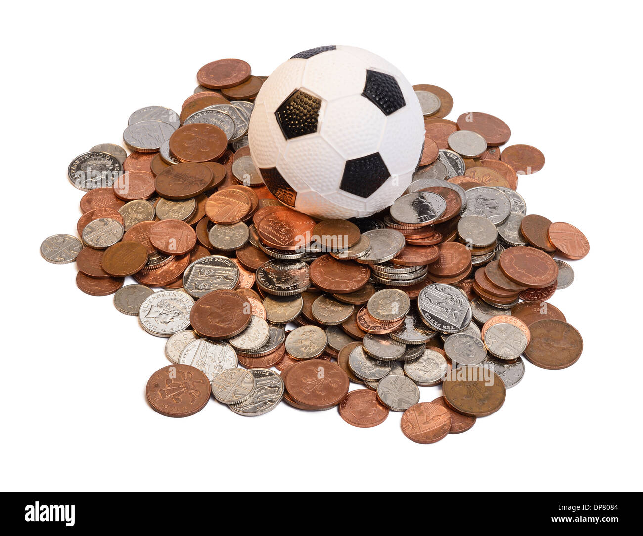 Fußball in der Mitte ein Stapel der Münzen Stockfoto