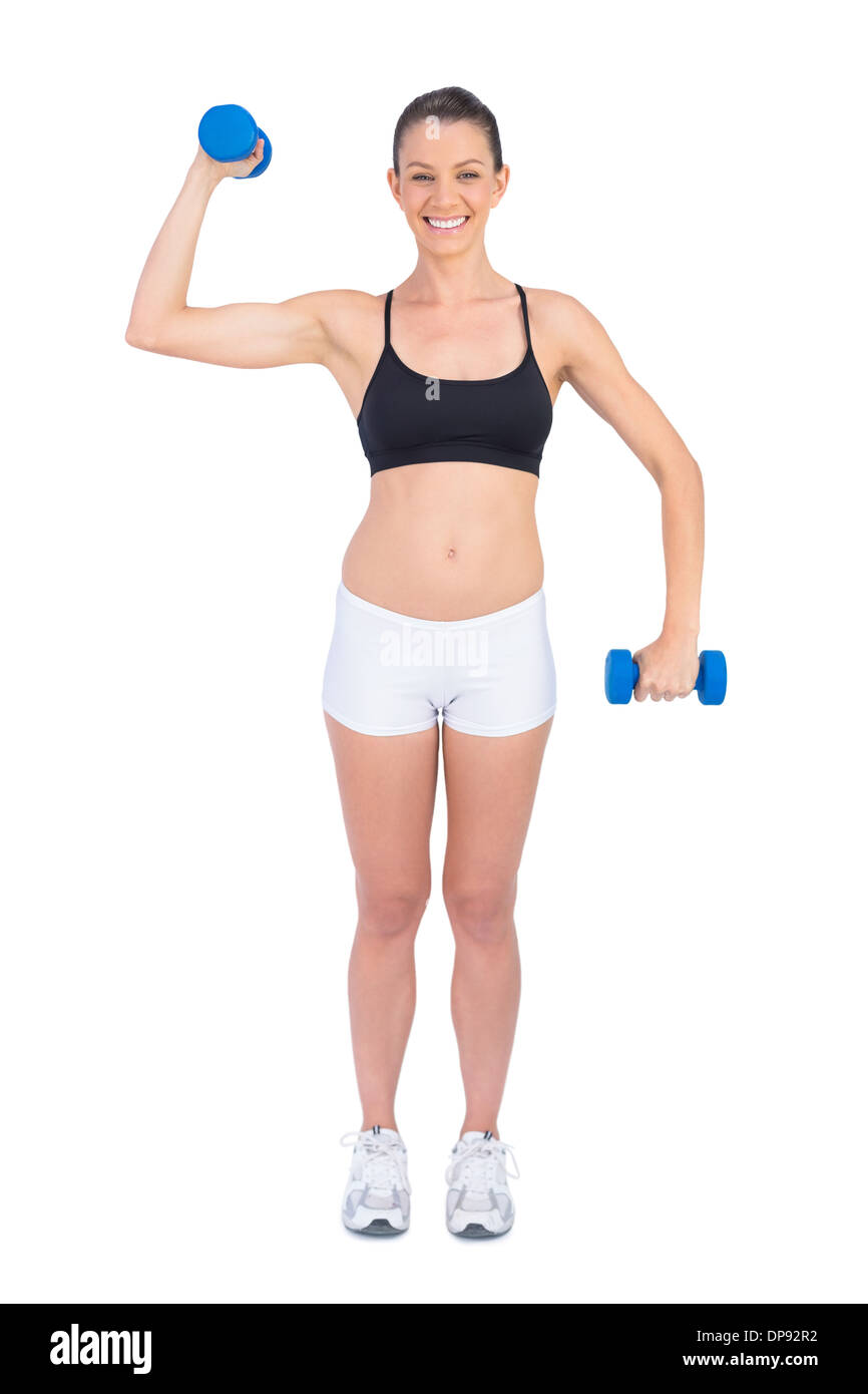 Happy fit Frau Training mit Hanteln Stockfoto