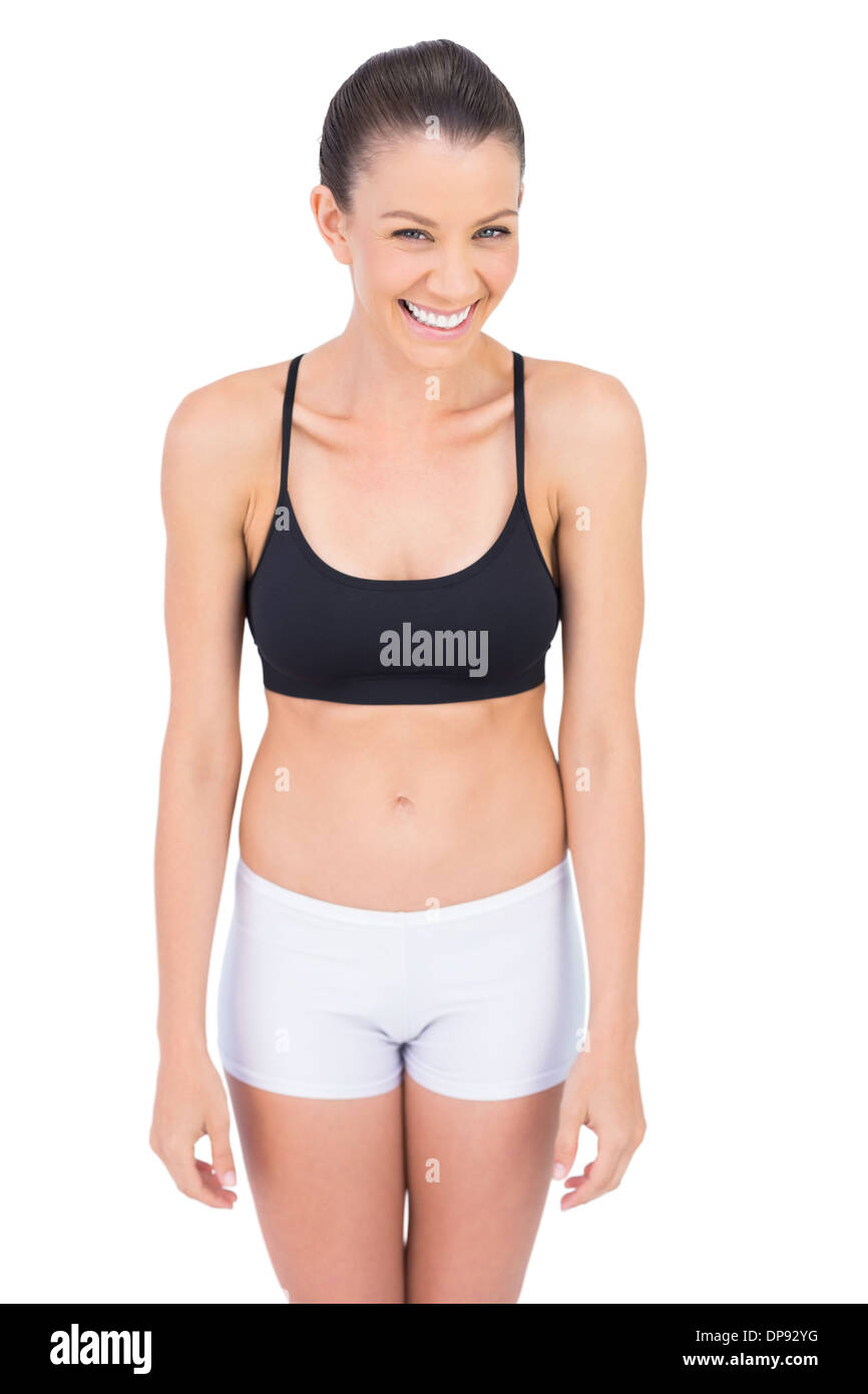 Lächelnd posiert Sportler passen Stockfoto