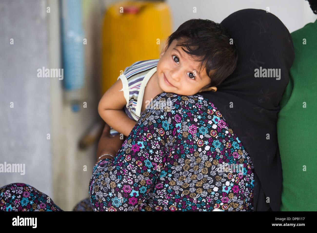 Die muslimische Frau und Kind, männliche Malediven Stockfoto