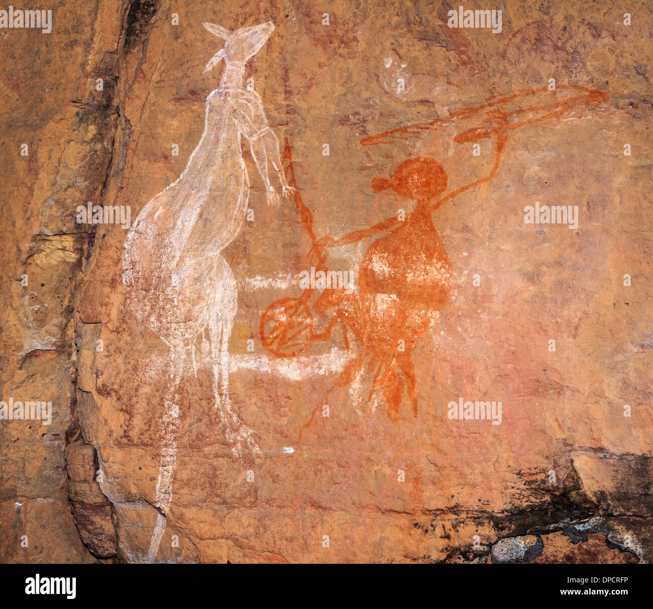 Alten Felsmalereien der Aborigines, Jagd Kängurus mit einem Speer, Kakadu-Nationalpark, Northern Territory, Australien Stockfoto