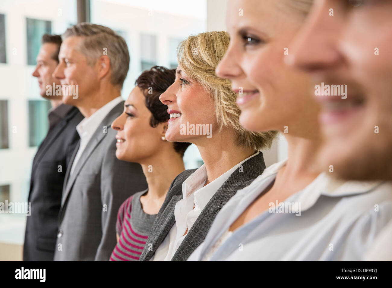 Geschäftsleute in Folge Stockfoto