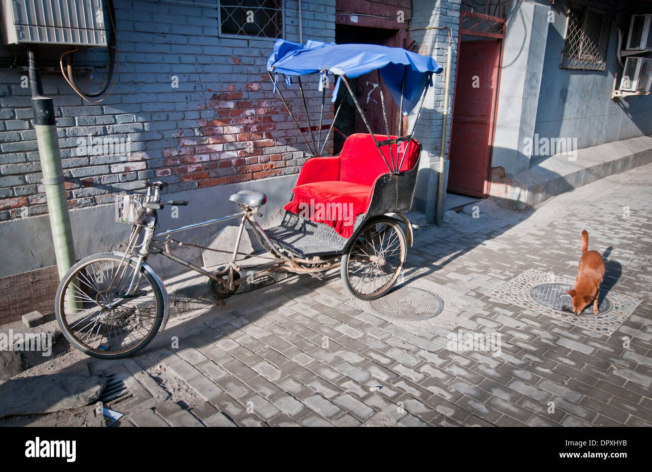 Fahrradrikscha Gebiet Hutong in Peking Stockfoto