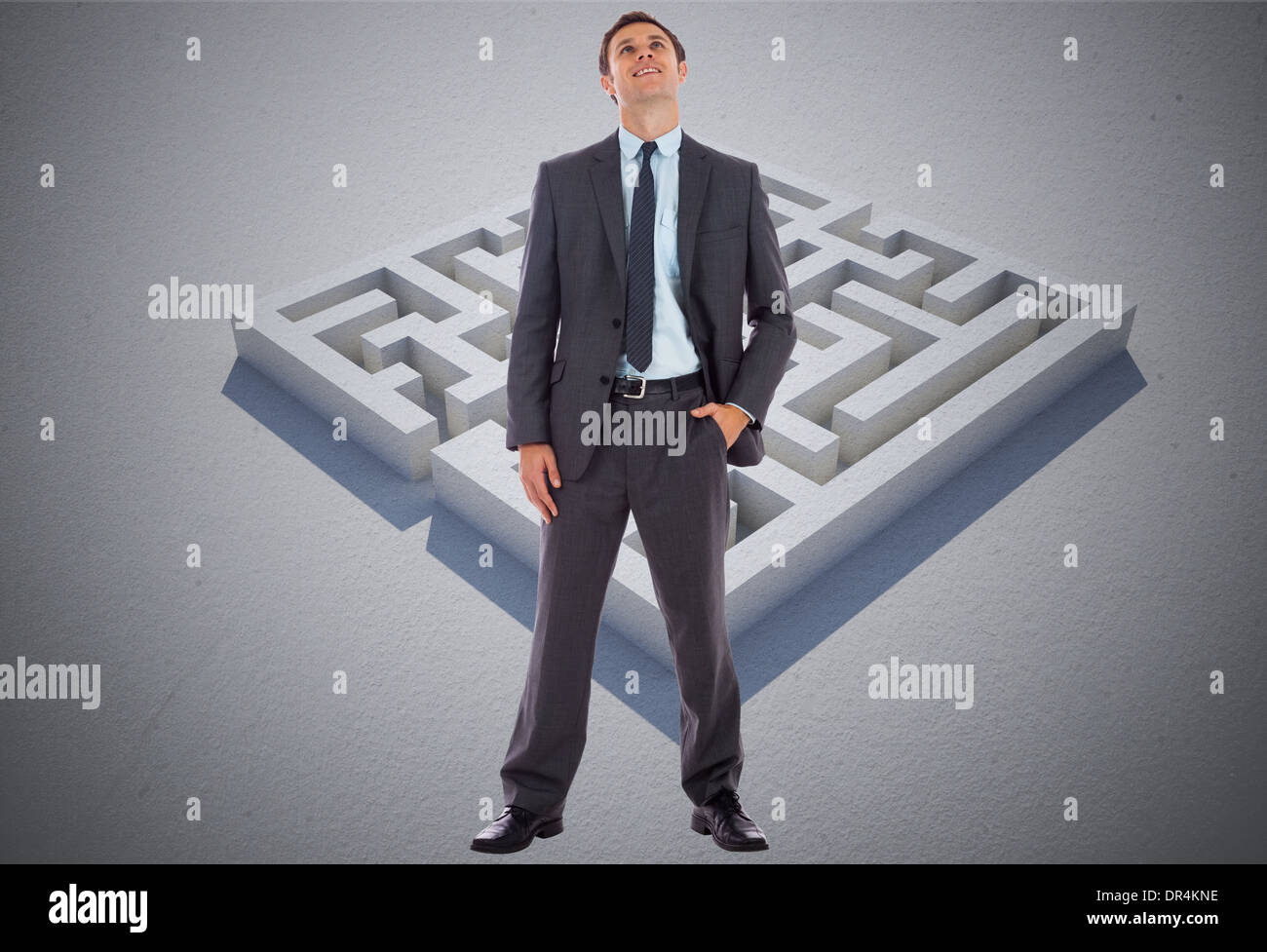 Zusammengesetztes Bild des glücklichen Geschäftsmann mit Hand in der Tasche Stockfoto