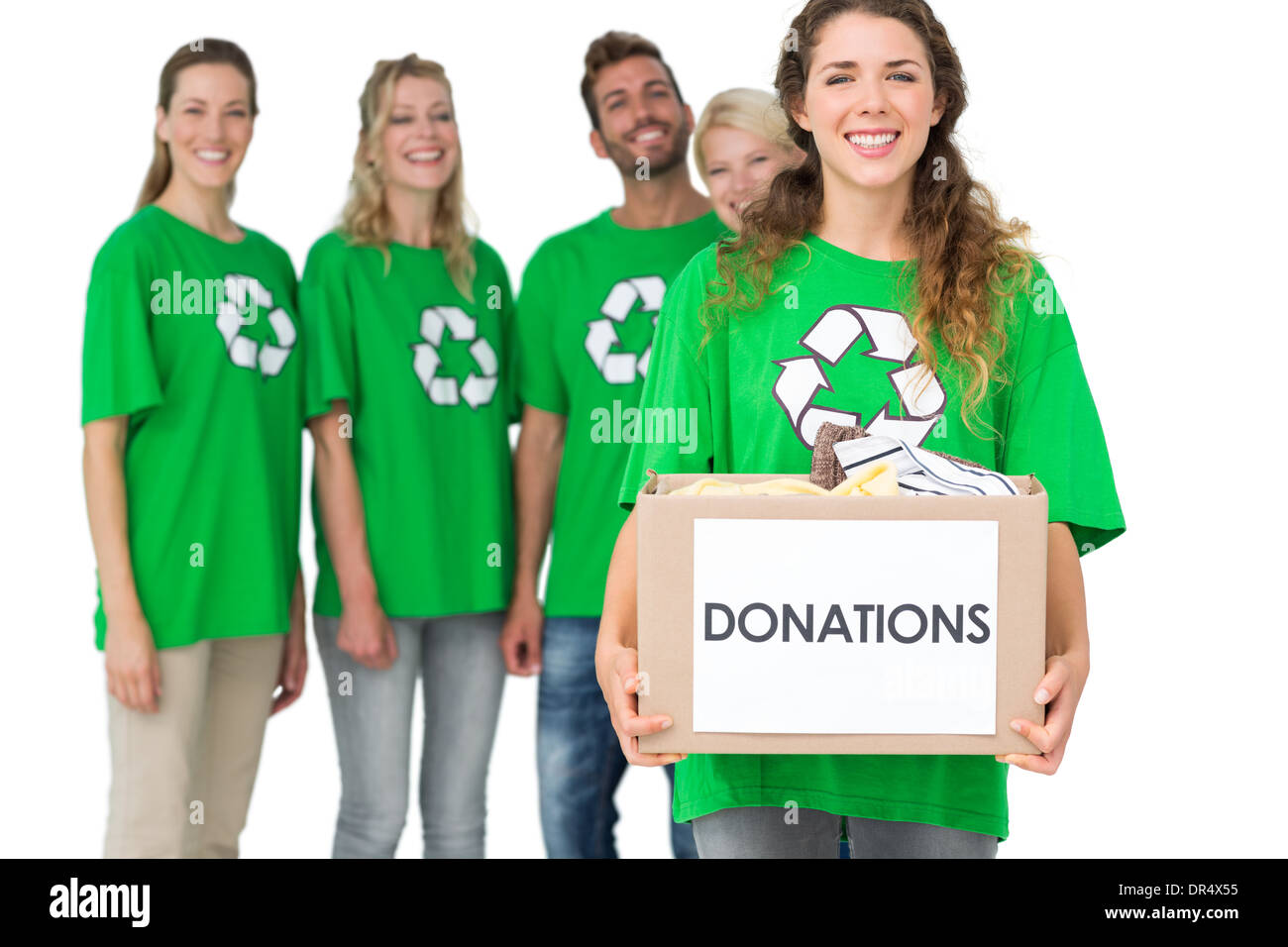 Menschen in recycling-Symbol T-shirts mit Spendenbox Stockfoto